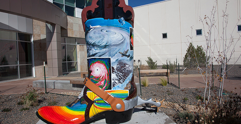 The Cheyenne Big Boots art installation was presented on NWSC grounds on behalf of the Cheyenne community at the conclusion of the grand opening ceremony (for the Wyoming Supercomputing Center).