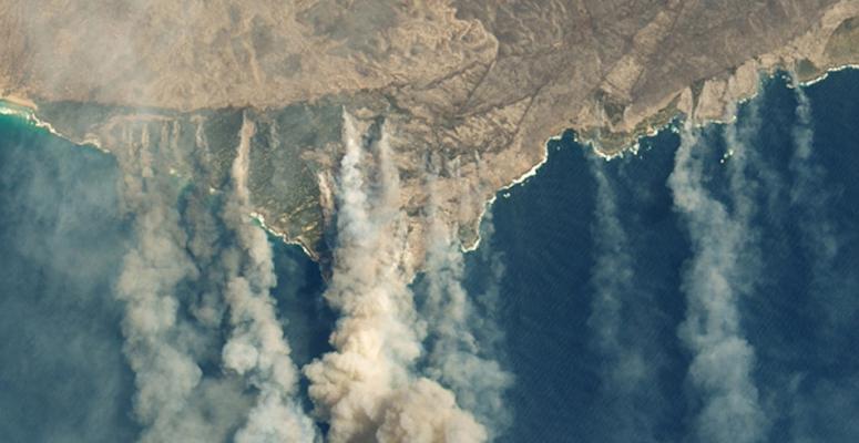 An image from NASA's Landsat 8 shows smoke billowing from major fires on Australia's Kangaroo Island