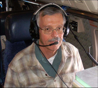 Principal investigator David J. Raymond with headset in an aircraft