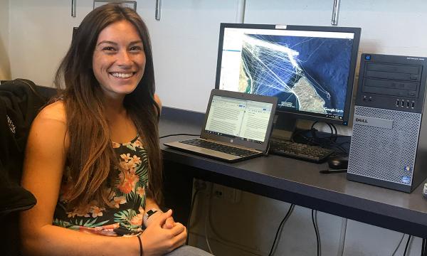 REU student working from their computer