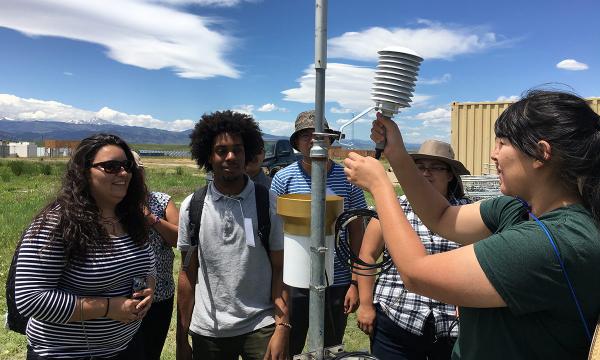 Students at NCAR install atmospheric instrumentation